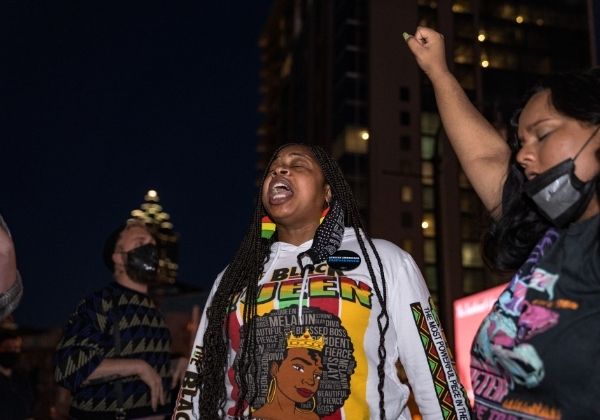 Community members and activists protest the killing of George Floyd