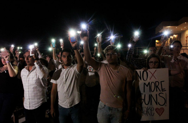 MEXICO-US-SHOOTING-VIGIL