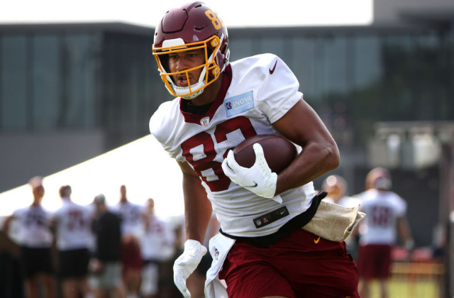 Logan Thomas #82 of the Washington Football Team runs with the ball during training camp at the Bon Secours Washington Football Team