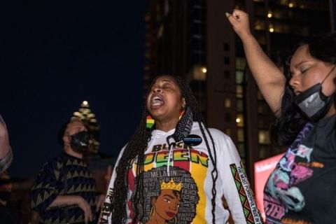 Community members and activists protest the killing of George Floyd