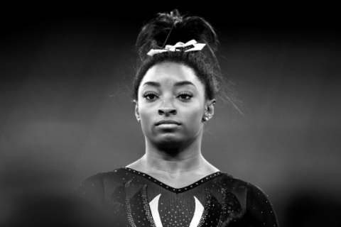 Simone Biles of Team United States looks on during Women's Podium Training ahead of the Tokyo 2020 Olympic Games at Ariake Gymnastics Centre on July 22, 2021 in Tokyo, Japan.