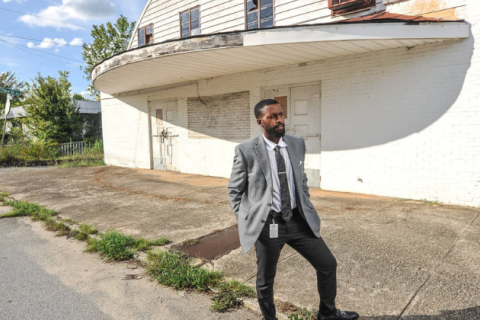 City Planner, Weston Stroud, in front of the Roxy Theater in Greenwood Bottom, Georgia.